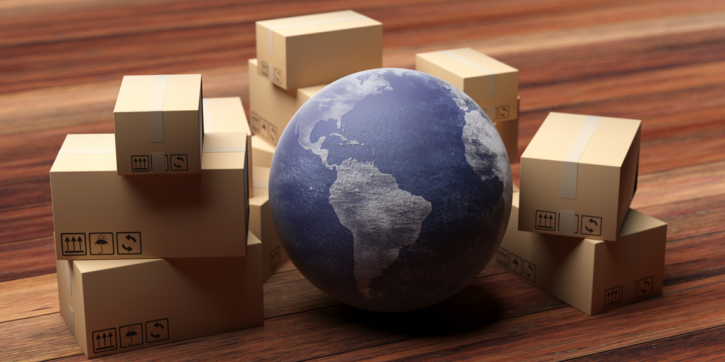 A Step by Step Guide to the International Moving Process 3D image of an earth globe surrounded by cardboard boxes on a wooden background. A Step by Step Guide to the International Moving Process