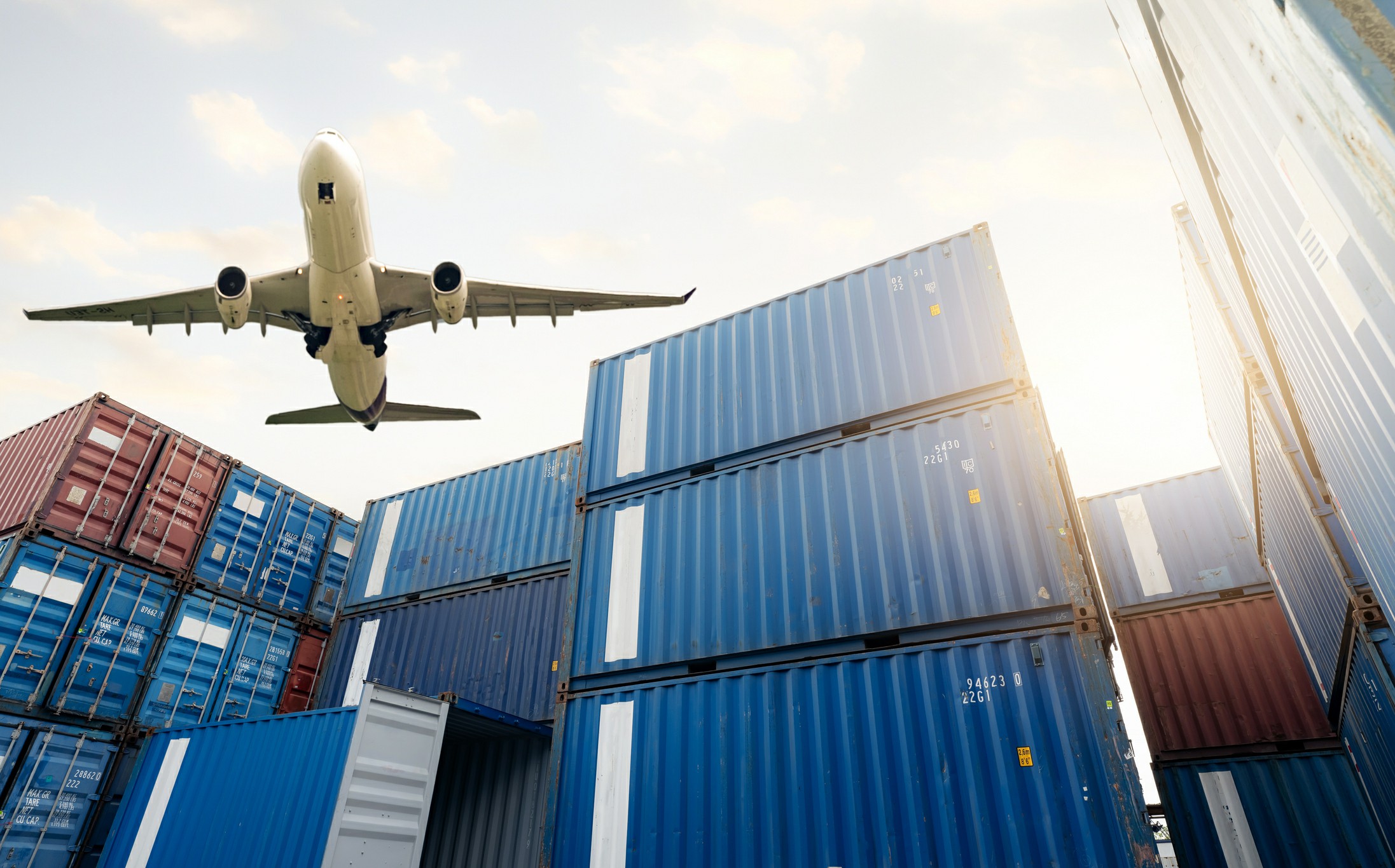Chess Moving does International Moves Shipping containers and a flying plane