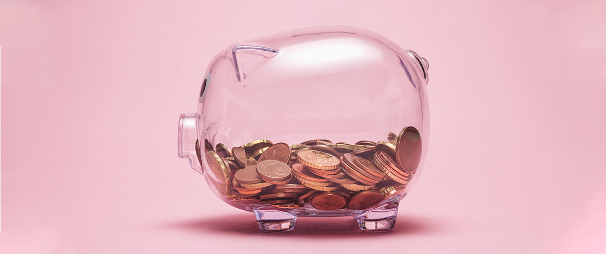 Saving money in piggy bank